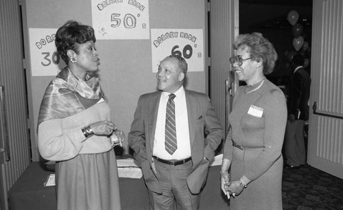 Diane Watson posing with others during the Dorsey High Family and Friends luncheon, Los Angeles, 1985