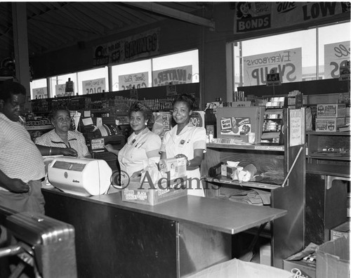 Women and man in a store, Los Angeles, 1955