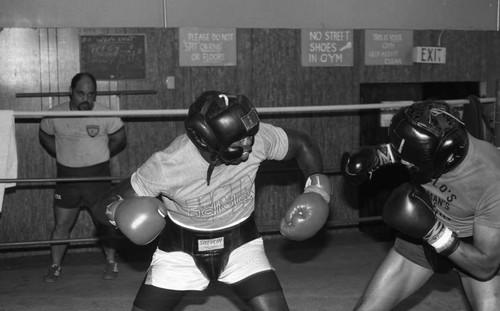 Paul Gonzales sparring with Henry Tillman, Los Angeles, 1985