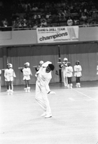 Locke High School student performing a solo at a LAUSD Band and Drill Team Championship, Los Angeles, 1983