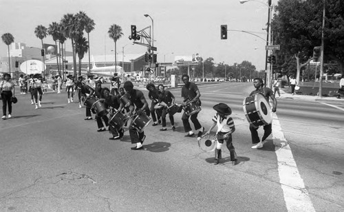 Drill team performing during the Elks Grand Temple Convention parade, Los Angeles, 1986