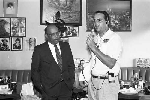 KGFJ staff interviewing a man during the Soul Search event, Los Angeles, 1975