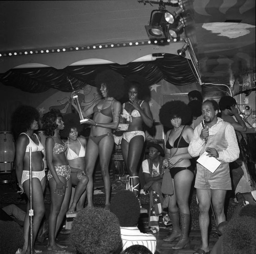 Booker Griffin hosting a "Bikini Night" event, Los Angeles, 1971