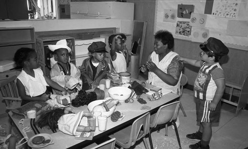 Los Angeles Urban League program participants meeting in a classroom, Los Angeles, 1991