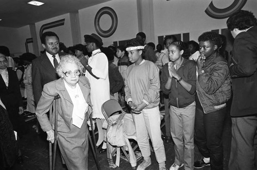 Lillian Rogers Parks and Rosa Parks walking through a Compton Unified School District crowd, Los Angeles, 1983