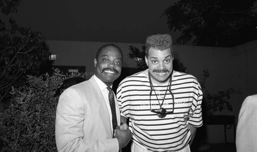 Sinbad posing with Ivan Burwell at the Black Radio Exclusive (BRE), Long Beach, California, 1989