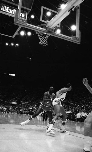 Moses Malone guarding Kareem Abdul Jabbar during the NBA All-Star Classic, Inglewood, 1983