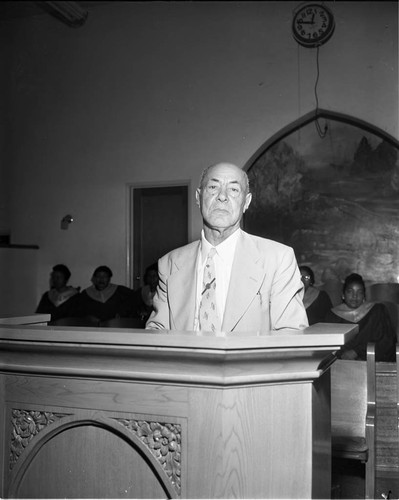 Man at podium, Los Angeles