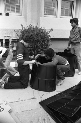 John Adams Jr. High School students planting a tree, Los Angeles, 1982