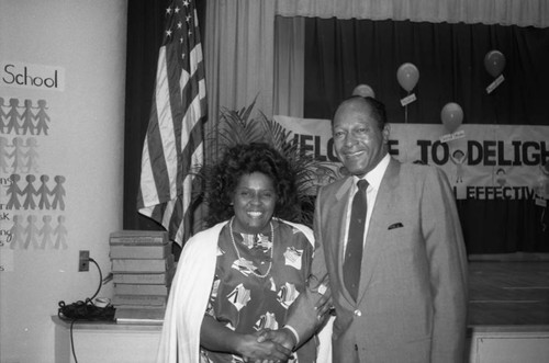 Tom Bradley posing with Dr. Genevieve Shepherd at Dublin Avenue School, 1986