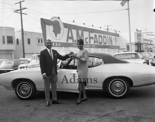 Handing over car keys, Los Angeles, 1968