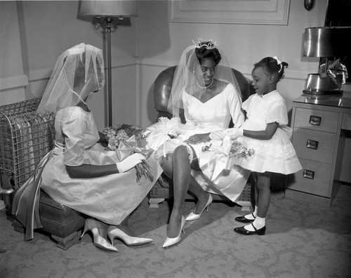 Bryant-Fair wedding party posing together, Los Angeles, 1962