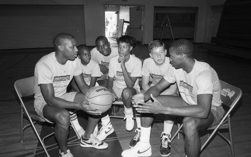 Byron Scott talking with Summerscope participants at Crenshaw High School, Los Angeles, 1986