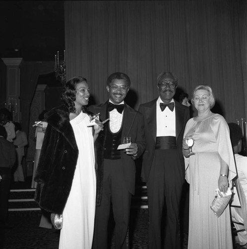 Couples attending a Brotherhood Crusade dinner at the Beverly Hills Hotel, Los Angeles, 1978