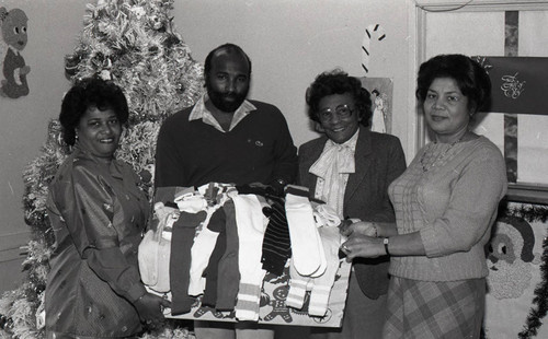 Alpha Lambda Chapter, Theta Mu Sigma Sorority members with Christmas stockings, Los Angeles