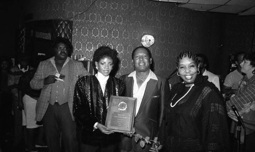 Melba Moore receiving an award at the Pied Piper, Los Angeles, ca. 1980