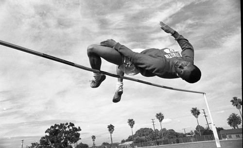 Marrie Burnett performs a high jump, Los Angeles, 1982