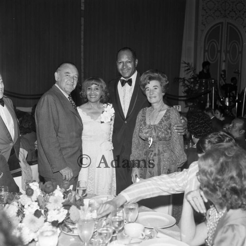 Tom and Ethel Bradley posing with guests during a Bradley tribute, Los Angeles, 1972