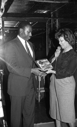 Oscar L. Edwards receiving an award, Los Angeles, 1986