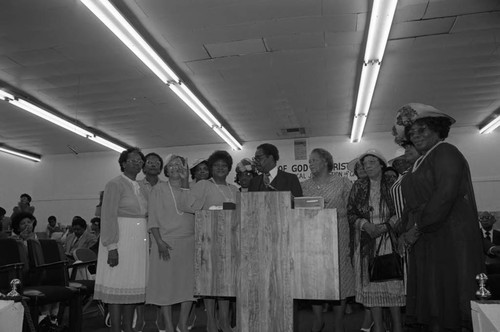 Church of God in Christ female members standing at the pulpit, Los Angeles, 1985