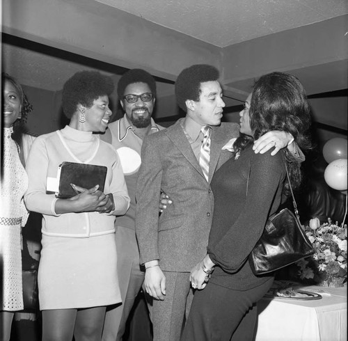 Smokey Robinson, Bobby Rogers and others at a party, Los Angeles, 1971