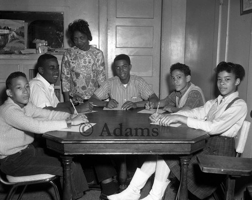 Doing work at the table, Los Angeles, 1966