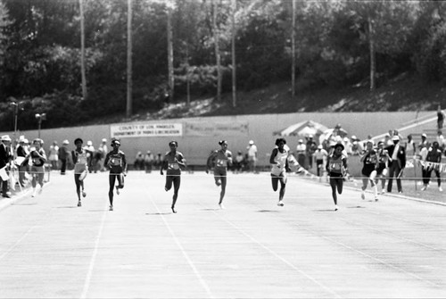 Evelyn Ashford and others approaching the finish line, Los Angeles, 1982