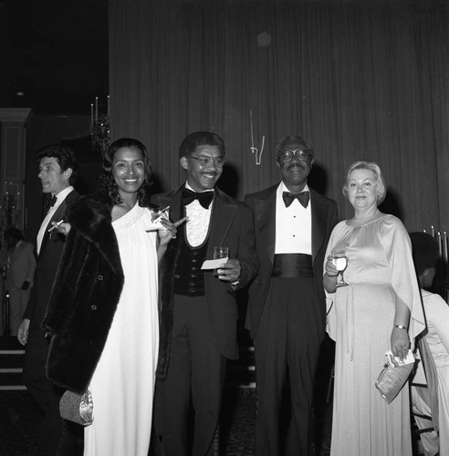 Couples attending a Brotherhood Crusade dinner at the Beverly Hills Hotel, Los Angeles, 1978