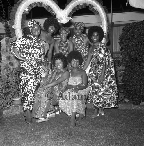 Women pose for photo, Los Angeles