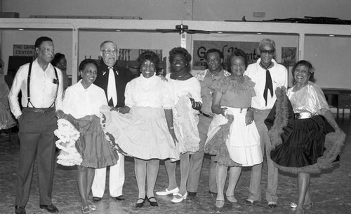 Van Meter Squares dancing group members posing together, Los Angeles, 1989