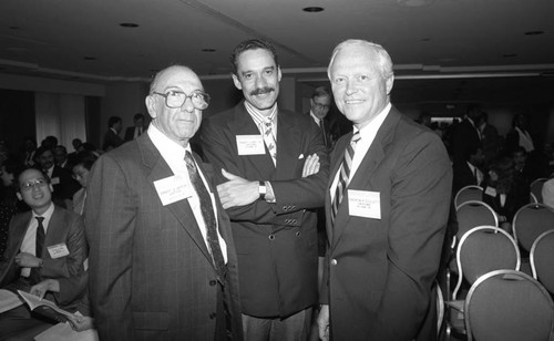 Judge Ernest S. Hayeck, Attorney Robert J. Grey Jr., and Benjamin R. Civiletti posing together, Los Angeles, 1990