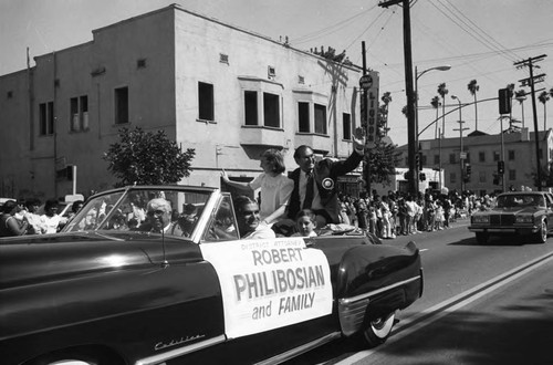 Robert Philibosian and his family riding in the 16th annual Easter parade, South Central Los Angeles, 1984