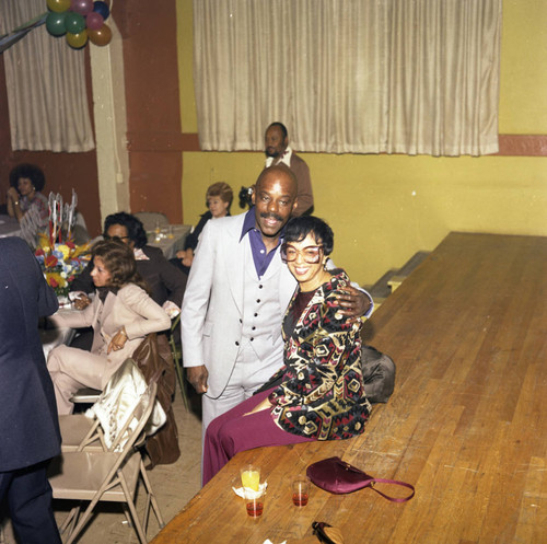 Gertrude Gipson posing with a guest at a Super Bowl party, Los Angeles