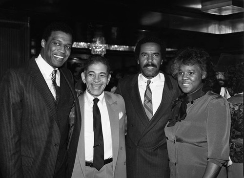 Bernie Casey, Adolph Caesar, and other actors at an awards celebration, Los Angeles, 1985