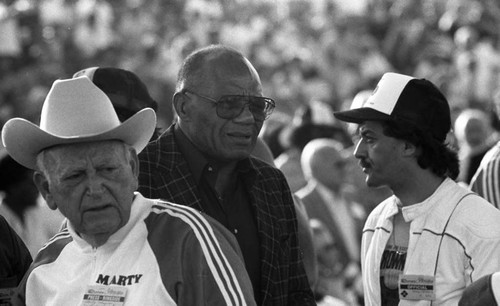 Joe Walcott sitting among a crowd at the Dokes-Weaver WBA Heavyweight title rematch, Las Vegas, 1983