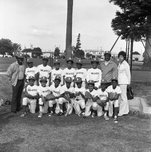 Broadway Braves Little League team posing together, Los Angeles, 1974