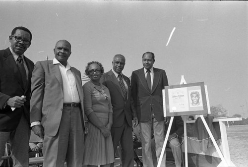 Brad Pye and Tom Bradley posing with the siblings of Jackie Robinson, Los Angeles, 1981