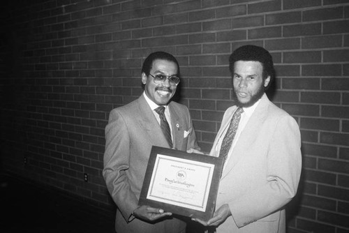 Crenshaw Chamber of Commerce award presentation to Douglas Washington, Los Angeles, 1986