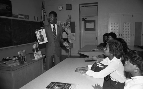 Man lecturing during Career Day at Dorsey High School, Los Angeles, 1982