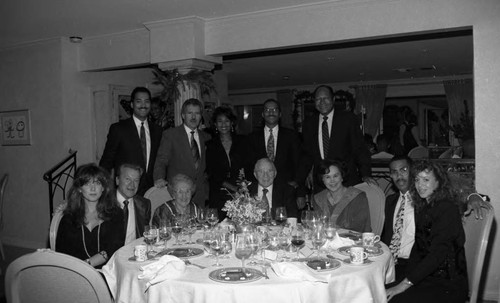 Tom Bradley, Vincent M. Bryson and Alex Trebek posing with supporters of the "Lou Rawls Parade of Stars" telethon, Beverly Hills, 1990