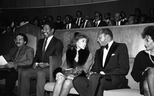 Vanessa Williams talking with Tom Bradley during the NAACP 75th anniversary kick-off celebration, Los Angeles, 1984