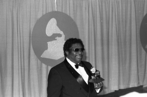 B. B. King posing with his Grammy at the 26th Annual Grammy Awards, Los Angeles, 1984