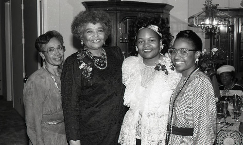 Gloria Brimberry posing with others at her recognition dinner, Los Angeles, 1989