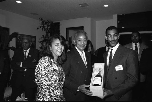 David Dinkins receiving a gift of champagne, Los Angeles, 1989