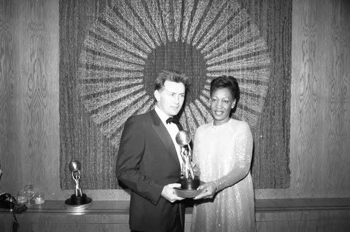 Maxine Waters and Martin Sheen posing together at the 17th Annual NAACP Image Awards, Los Angeles, 1984