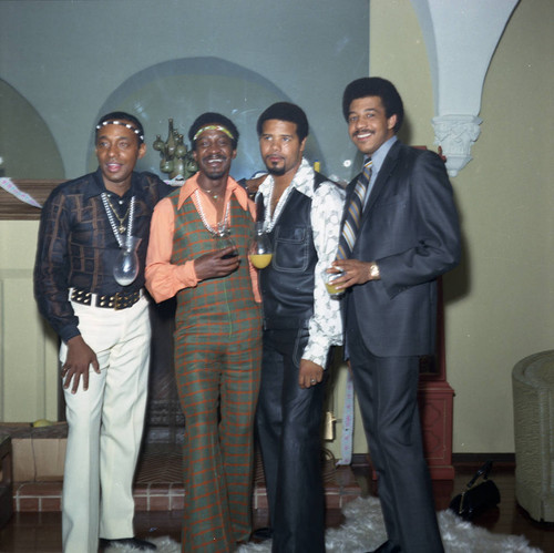 Four African American men at a party, Los Angeles