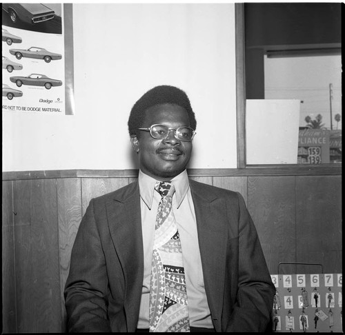 African American automobile salesman posing for a portrait, Los Angeles, 1971