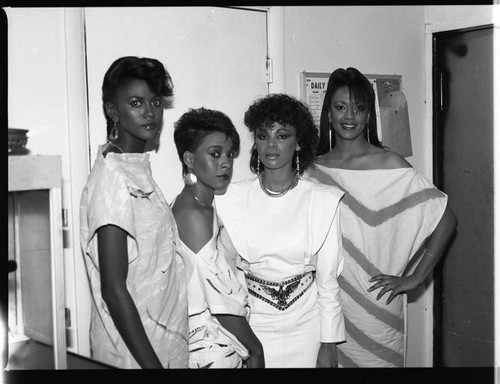 Debbie Jackson posing with three women at the Pied Piper nightclub, Los Angeles, 1985