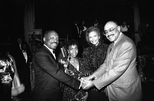 Willie Brown shaking hands at a Black Women's Forum event, Los Angeles, 1989