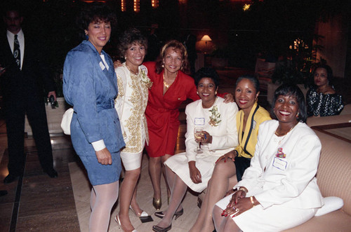 Iris Rideau posing with others at an event for Chief Willie Williams, Los Angeles, 1992